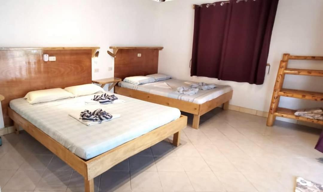 Sulu Sunset Beach Resort Nauhang Buitenkant foto