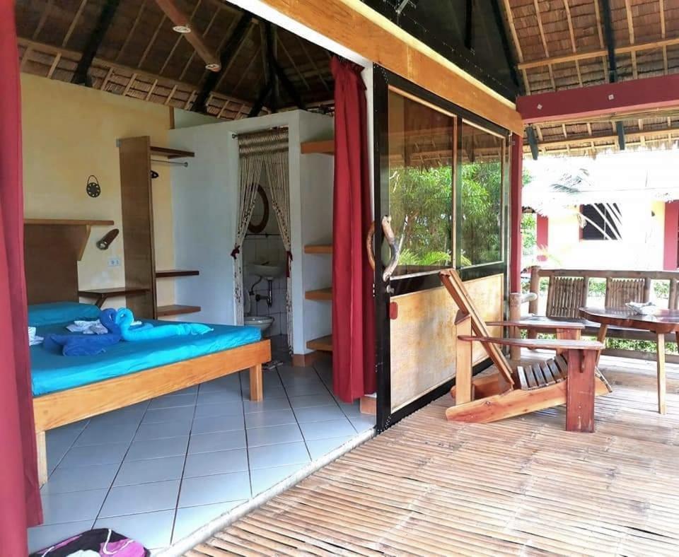 Sulu Sunset Beach Resort Nauhang Buitenkant foto