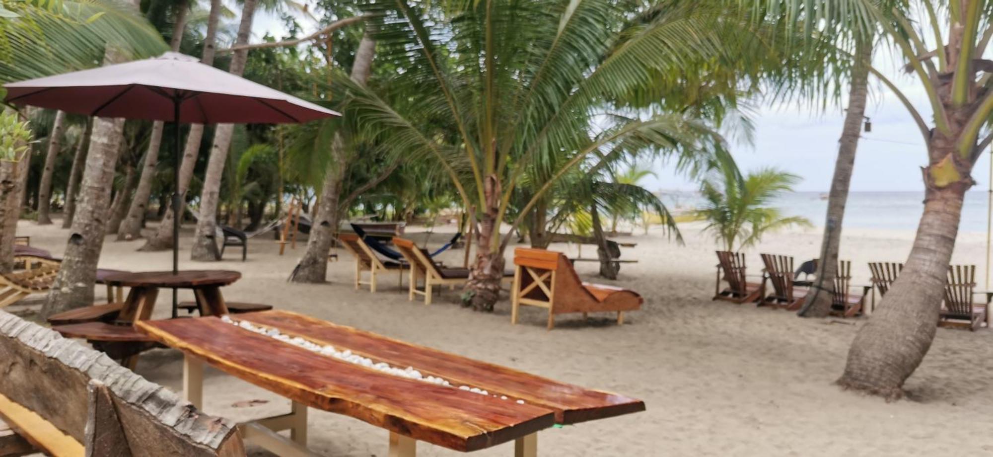 Sulu Sunset Beach Resort Nauhang Buitenkant foto